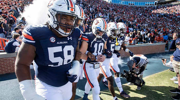 Auburn players take the field as Auburn Tigers take on Mississippi State Bulldogs at Jordan-Hare Stadium in Auburn, Ala., on Saturday, Nov. 13, 2021.